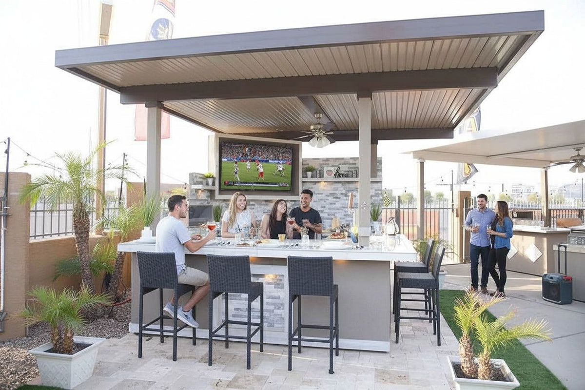 Luxterra Outdoor Living KoKoMo Bermuda BBQ island with built-in TV, fire pit, and bar seating for outdoor entertaining.